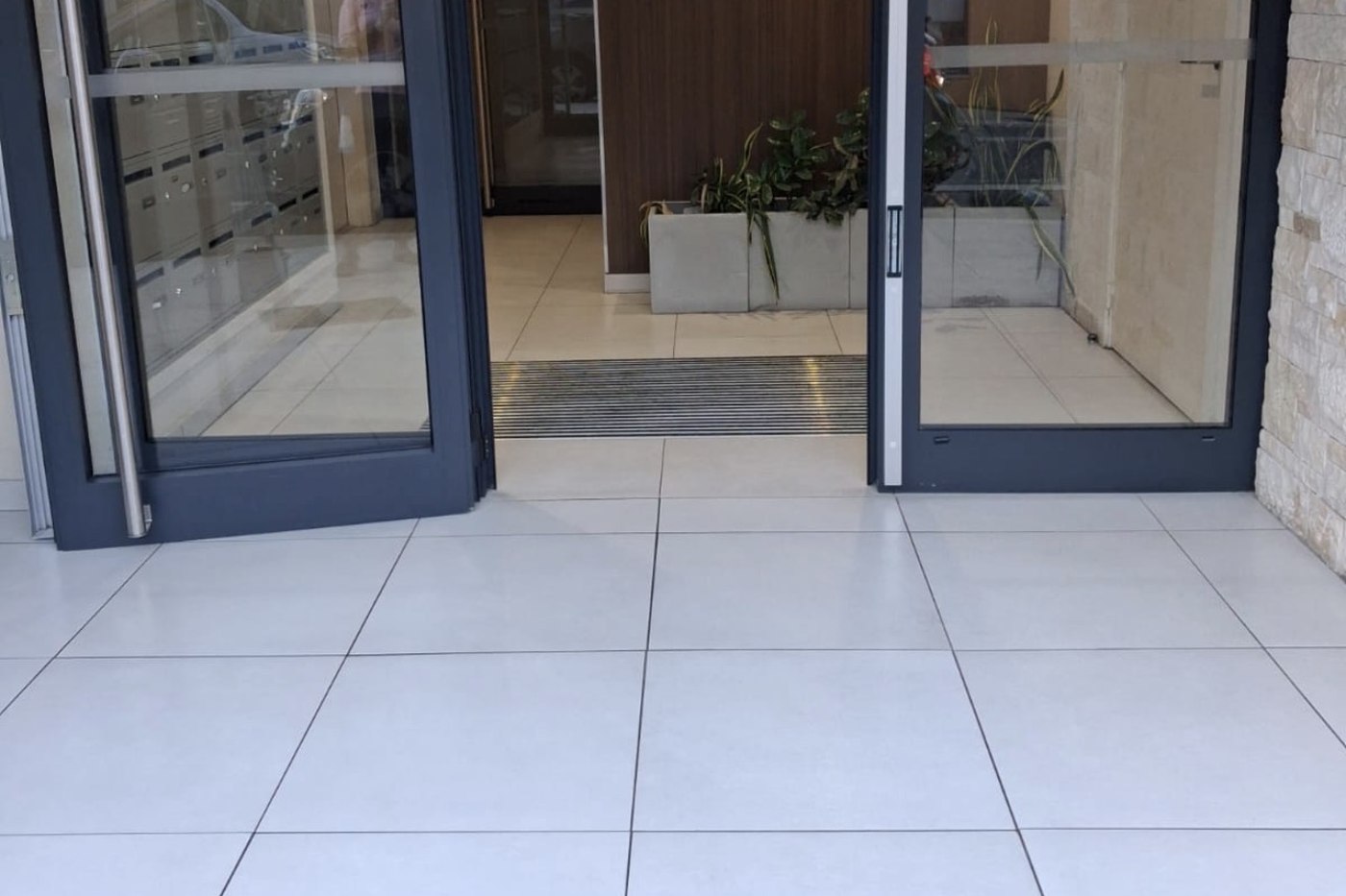Hall de copropriété entretenu par Tâche de Propre